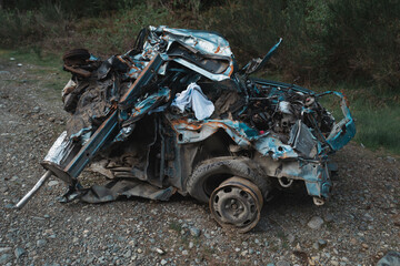 Fototapeta na wymiar Compacted or crashed vehicle