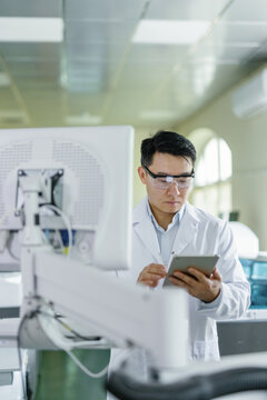 Researcher chemical engineering gadget laboratory worker analyse 