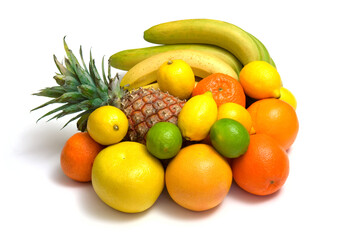 tropical fruits against white background