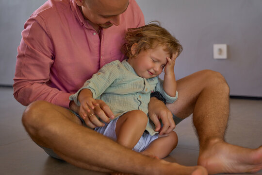 cranky child with a parent 
