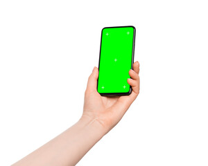 Isolate of a female hand with a smartphone. Green screen on device screen, easy to insert your ads.