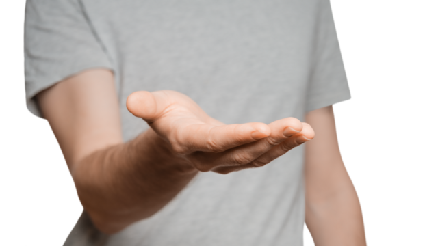 A man in a gray T-shirt holds out his hand to the camera, palm up. Male silhouette isolate on white background. Showing his hand to the camera. - Powered by Adobe
