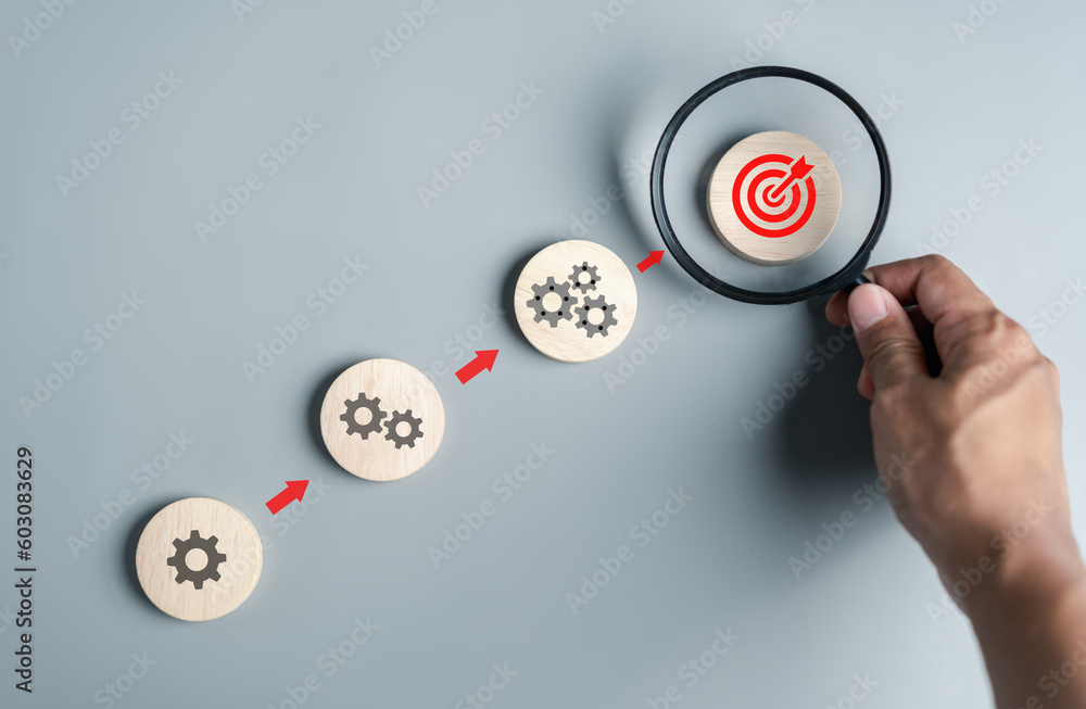 Aufkleber Hand holding magnifier to analysis target objective pointing management, Steps planning development and business concept.