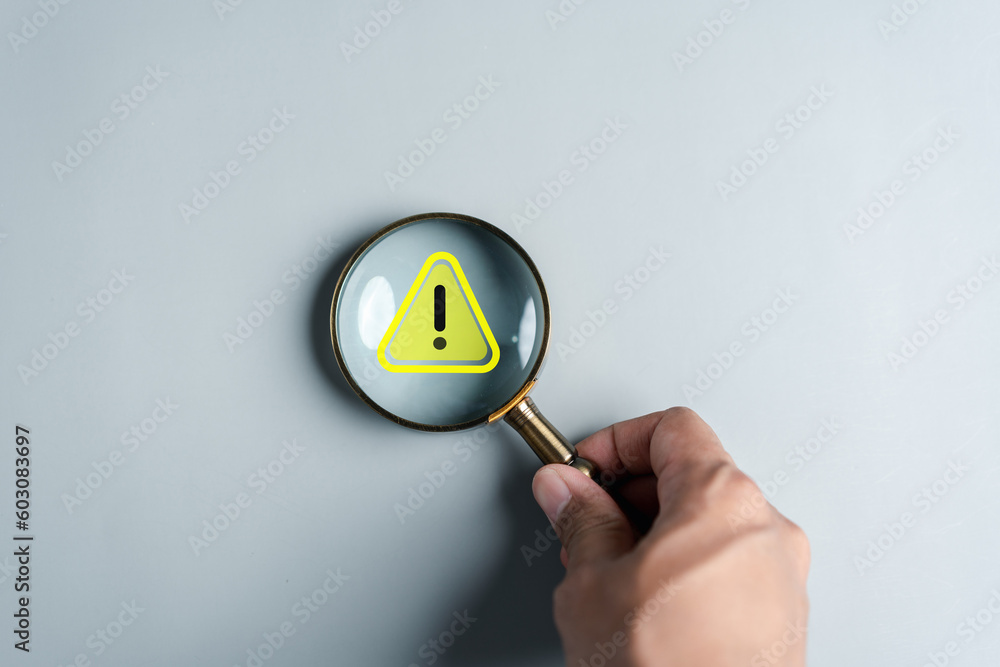 Poster System warning caution sign inside magnifier for notification error and maintenance. cyber attack on computer network. data breach, illegal connection, compromised information.