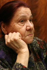 Sad grandmother close-up. Woman in her eighties.