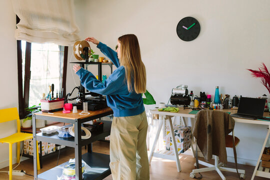 Woman working at a craft workshop