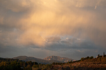 time clouds over the mountains