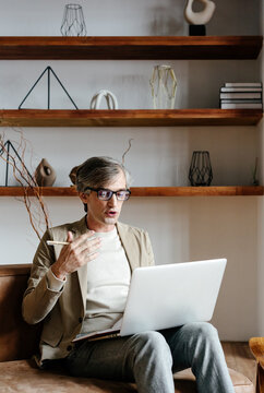 Male psychologist having video call for psychotherapy session