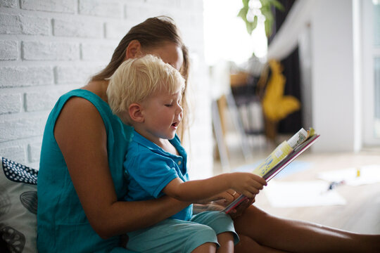 mother and son reading