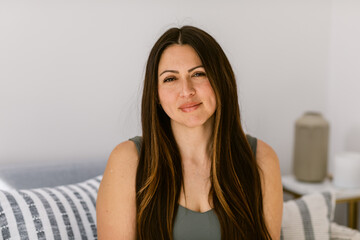 Pretty woman calmly on couch