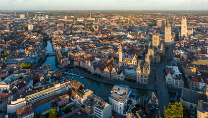 Ghent Belgium Aerial Flying over downtown area with church cityscape views at sunset time - October...