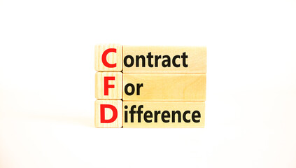 CFD symbol. Concept words CFD contract of difference on beautiful wooden block. Beautiful white table white background. Business and CFD contract of difference concept. Copy space.