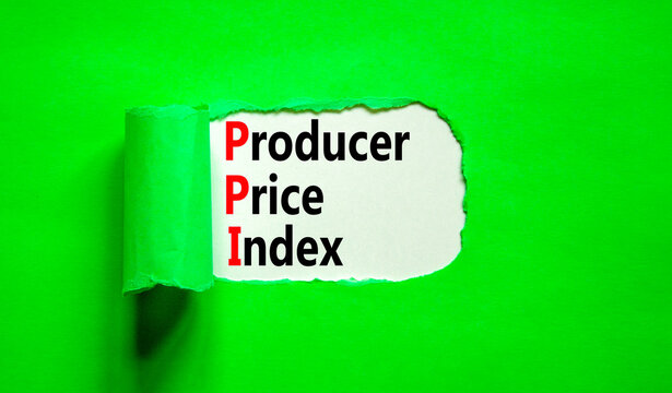 PPI Producer price index symbol. Concept words PPI Producer price index on beautiful white paper. Beautiful green table green background. Business and PPI Producer price index concept. Copy space.