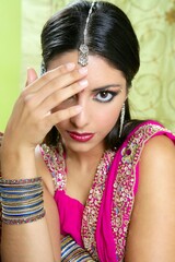 Fototapeta premium Beautiful indian brunette portrait with traditionl costume