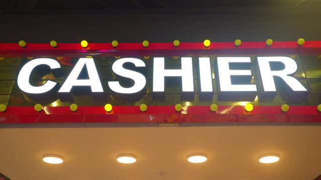 Neon sign flashing Cashier decorated with flickering light bulbs in the gaming entertainment zone area 4K