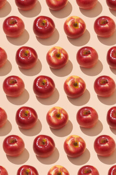 Apples of different colors lie on a white background