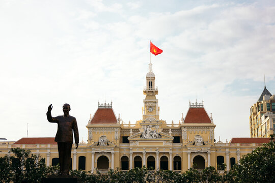 Saigon City Hall facade and Ho Chi Minh statue