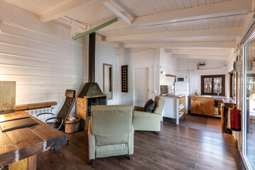 Rustic wooden home design with interior fireplace