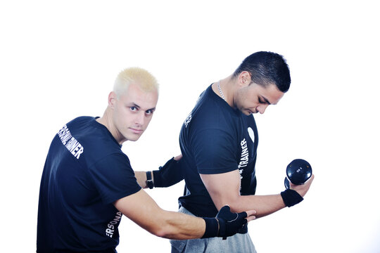 man fitness personal trainer in sport club