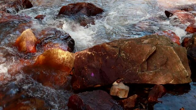 The small river known as Rio dos Goianos that flows into the Waterfall Known as Cachoeira Boqueirao in Paranoa, Brazil, near Brasilia