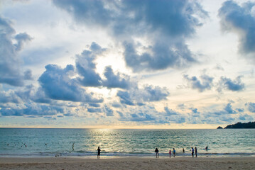 Fototapeta na wymiar blue cloudly sunset at the Patong beach, Phuket, Thailand