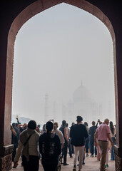 The first glimpse of the Taj Mahal at sunrise in Agra, India