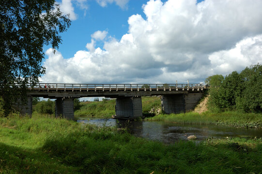 Old wooden bridge in northern russian village
