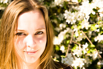 Naklejka premium Young Blond Woman Resting In Park