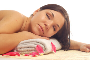 Fototapeta na wymiar attractive brunette woman relaxing in spa salon