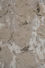 Detail of cement globs in old wall refurbishing