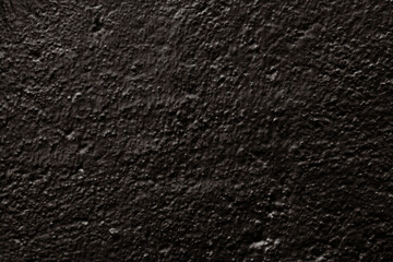Detail of wall black stippled paint