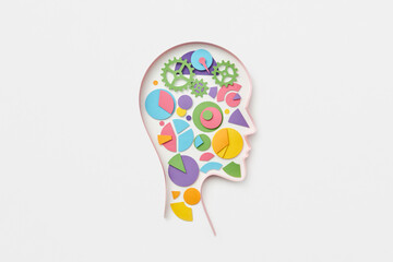 Human head with paper gears and circle charts.
