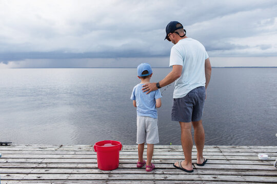 Series of a young boy fishing with his dad