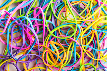 Many colorful rubber bands. Closeup.