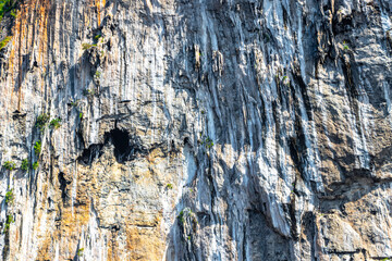 Rock cliff wall texture limestone islands Koh Phi Phi Thailand.