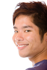 Closeup of Asian man smiling happy into camera. Isolated on white.