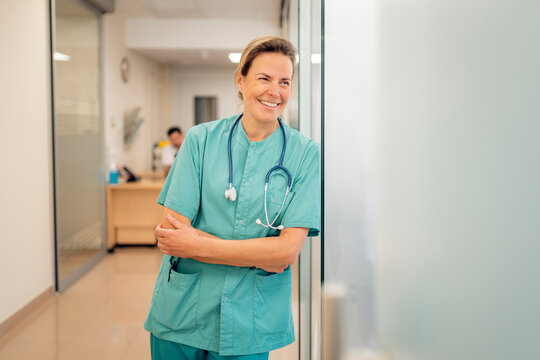 Doctor chatting In A Hall Of An Hospital