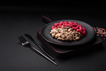 Delicious fusilli pasta with beetroot pesto, parmesan, salt and spices