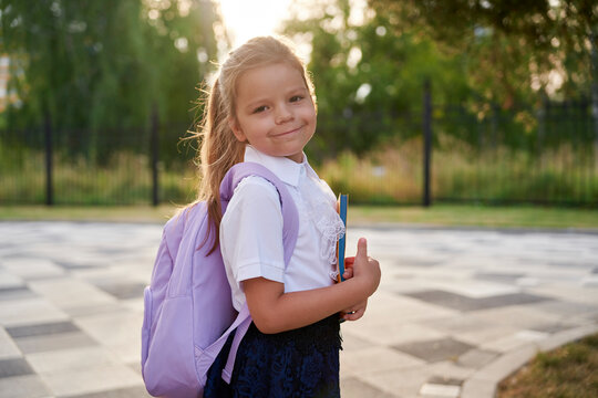 Portrait of a young girl getting read to go to kindergarten