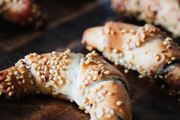 Making croissants. Bakery handmade products.The croissants have just come out of the oven. Ready to sell. 
