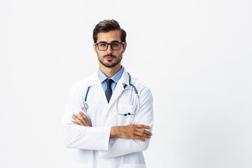 Fototapeta premium Man portrait of a doctor wearing a white coat and eyeglasses and a stethoscope looking into the camera on a white isolated background, copy space, space for text, health