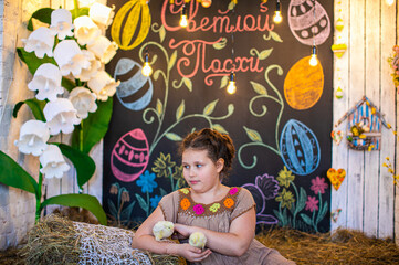 Beautiful girl in white dress standing on bed