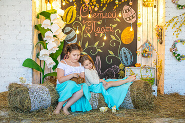 Beautiful girl in white dress standing on bed