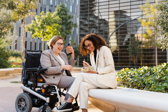 Businesswomen Eating Lunch Together Outside