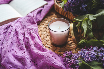 Candle, lilac and open book, good morning aesthetic