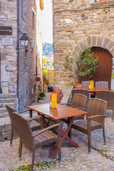 Fototapeta na wymiar Terrace furniture at Besalu Medieval City, Besalu, Catalonia, Spain