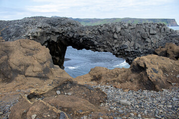 The famous natural black rock arches of Iceland
