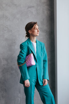 Confident woman in fashionable suit