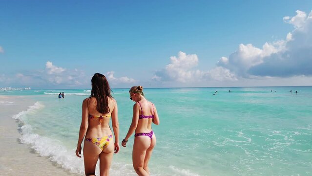 Girls on the beach in Cancun, Mexico