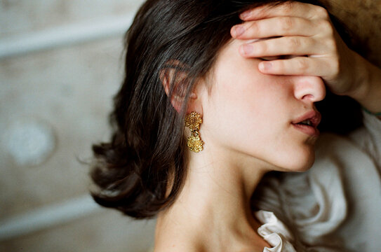Woman closed her eyes with a hand